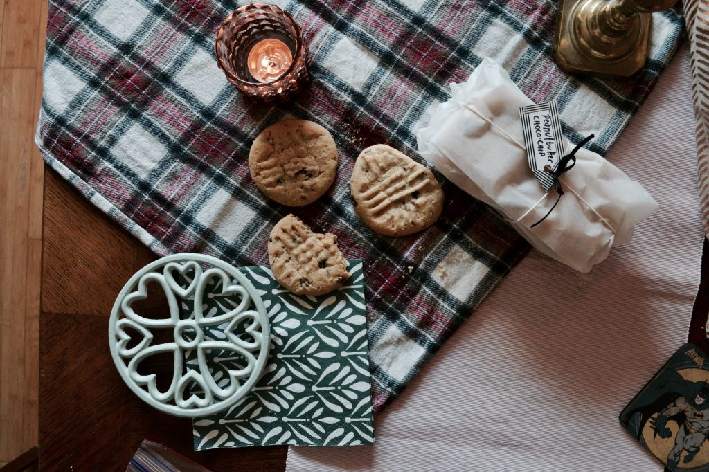 cookies-on-table-with-candle-and-scarf